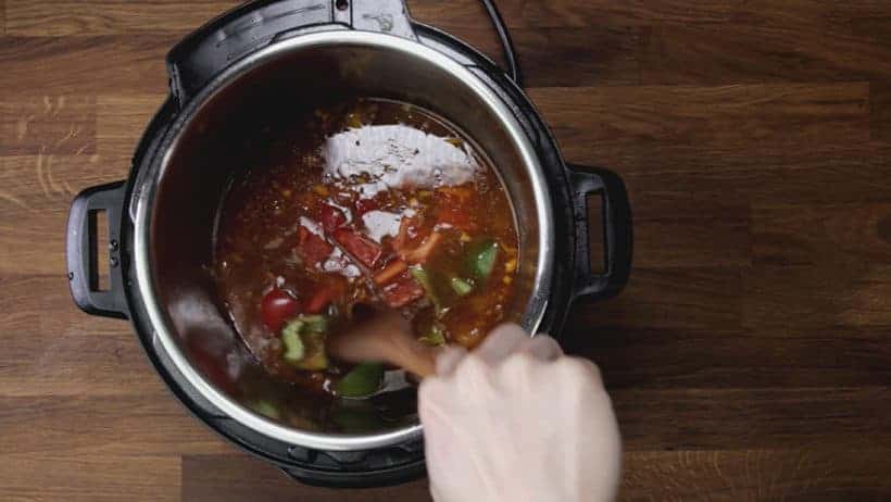 add pineapple chunks and chopped bell pepper and heat up the sweet and sour sauce