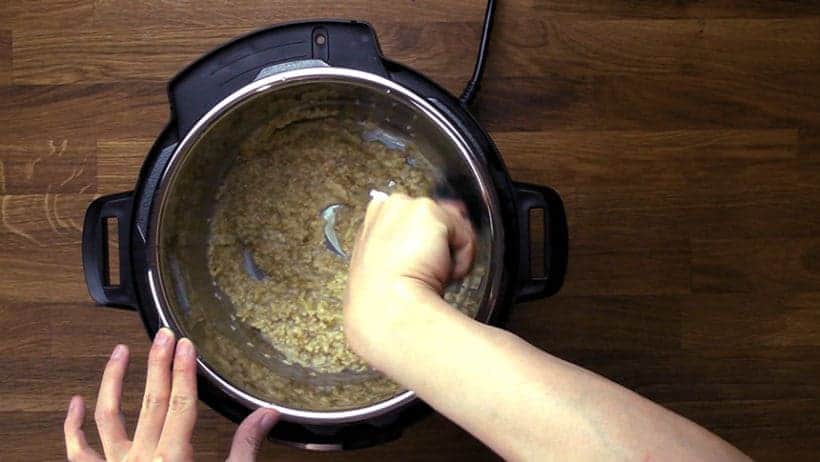 The steel cut oats will look watery when you first open the lid. 