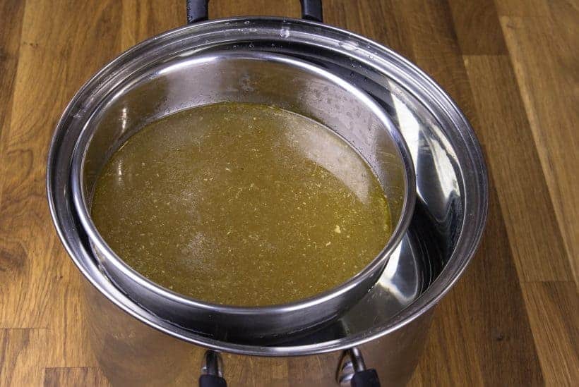 fastest way to cool the homemade turkey stock with cold water