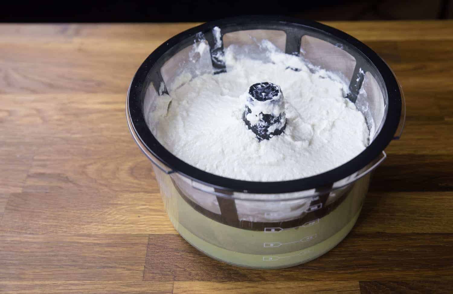 Foolproof Instant Pot Greek Yogurt Recipe #12 (Pressure Cooker Greek Yogurt): straining the yogurt with Greek Yogurt Maker to separate the whey from the yogurt