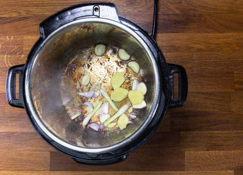 Instant Pot Chinese Beef Stew: saute garlic, ginger, shallot, green onions in Instant Pot Pressure Cooker