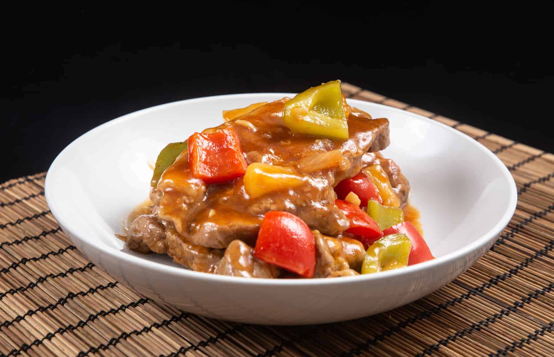 Instant Pot Sweet 'n Sour Pork Chops Recipe. Make this Top Selling Chinese Takeout: tender, juicy Pressure Cooker Pork Chops in a deliciously sweet and sour yummy sauce. Add this to your easy weeknight meal plan! #instantpot #instapot #instantpotrecipes #pressurecooker #recipes #chineserecipes #porkrecipes