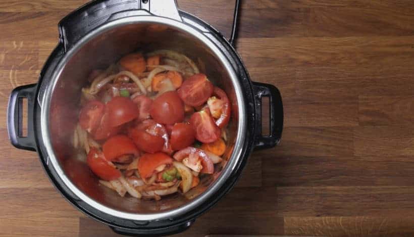 add in quartered tomatoes