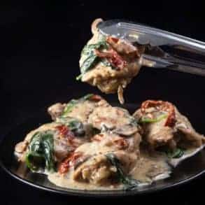 Creamy Instant Pot Tuscan Chicken Recipe (Pressure Cooker Tuscan Garlic Chicken): Make Italian-inspired tender chicken in simple yet richly balanced creamy garlic sauce with caramelized mushrooms and sweet sun-dried tomatoes. Crazy satisfying easy weeknight meal! #instantpot #instapot #pressurecooker #powerpressurecooker #instantpotrecipes #recipes #italianrecipes #chicken