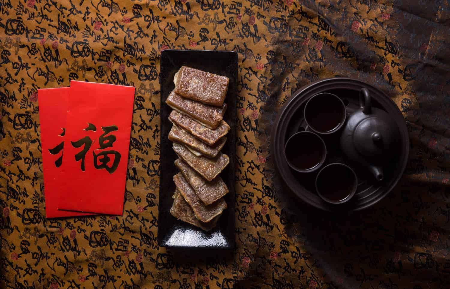 Our family's traditional Pan Fried Nian Gao Recipe (Chinese New Year Cake) made with our secret ingredient: sweet & gooey rice cake with crisp fragrant egg.