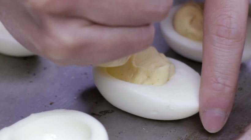 Pipe dressing into egg whites