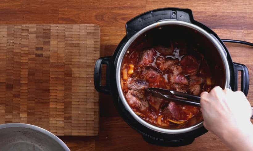 Instant Pot Vietnamese Beef Stew: partially soak cubed beefs in bo kho sauce in Instant Pot   #AmyJacky #InstantPot #PressureCooker #beef #asian #recipes