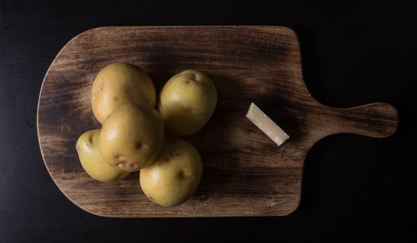 halve yukon gold potatoes, grate parmesan cheese